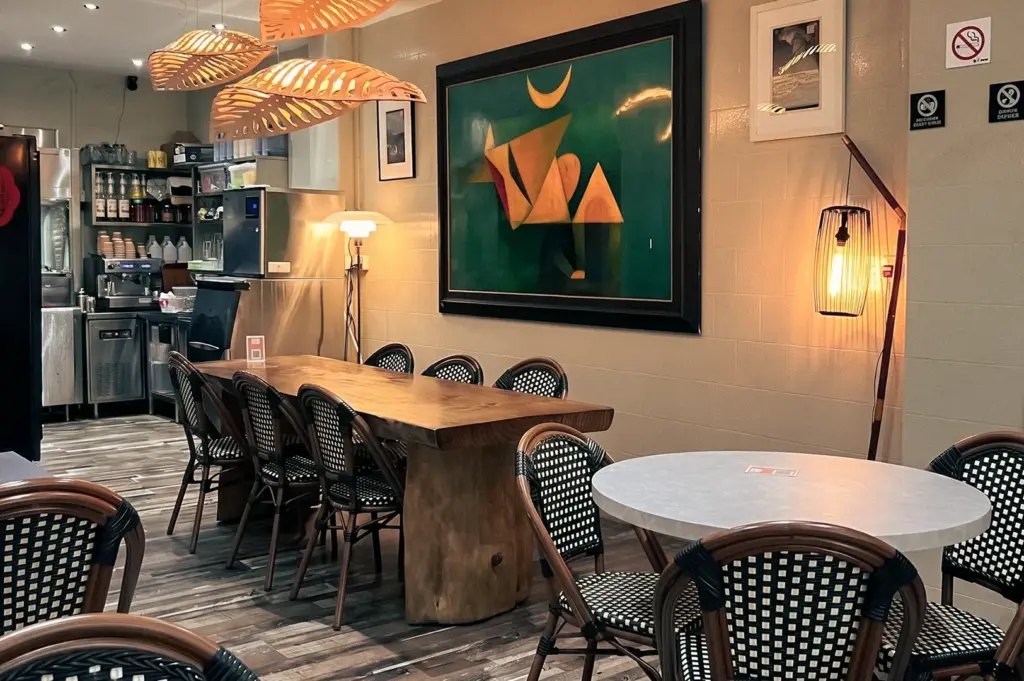 Warm and modern seafood restaurant dining area where premium pomfret dishes are served, featuring elegant lighting, comfortable seating, and a welcoming atmosphere.